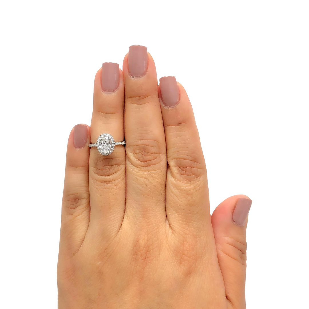 Harry Winston Platinum Halo Oval Diamond 1.54ct TW DVVS1 Engagement Ring