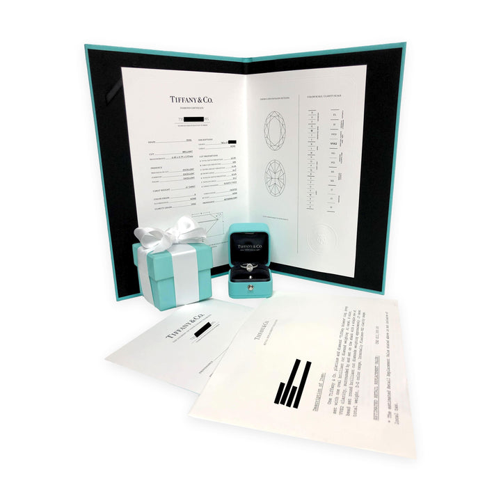 Tiffany & Co. Soleste Oval .88 cts total Diamond Engagement Ring Platinum H VVS2