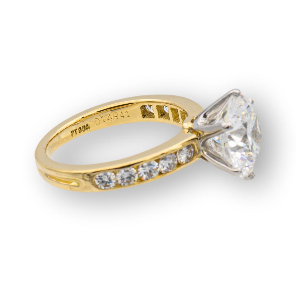 Vintage Tiffany and Co. 18K Yellow Gold Platinum Channel Set Round Diamond Engagement Ring 2.69Cts. FVVS1