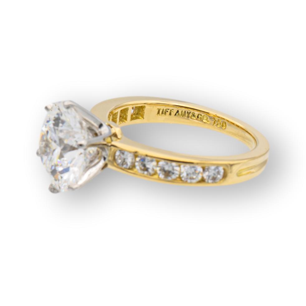 Vintage Tiffany and Co. 18K Yellow Gold Platinum Channel Set Round Diamond Engagement Ring 2.69Cts. FVVS1