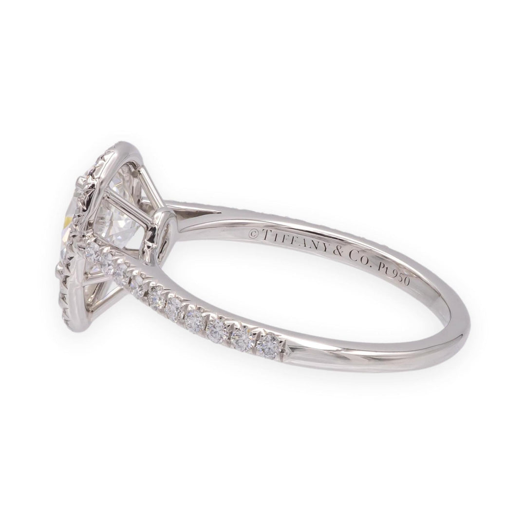 Close-up of a Tiffany & Co. platinum diamond ring showing the inner band hallmark used for authenticity checks.