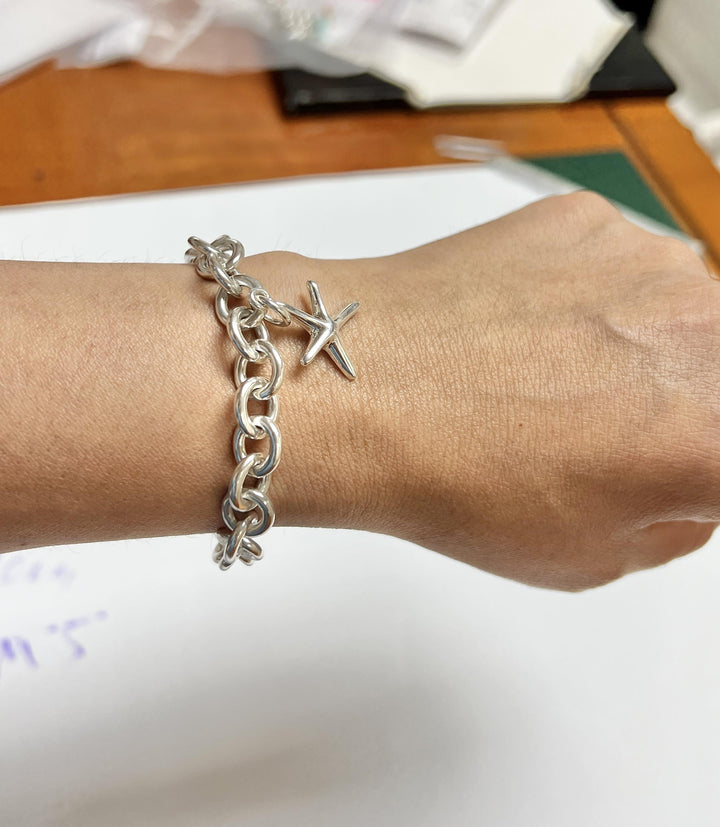 Tiffany & Co. Sterling Silver Heart Charm Bracelet with starfish charm 7.25"