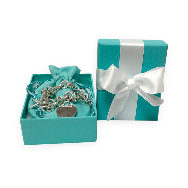 Tiffany & Co. Sterling Silver Heart Charm Bracelet with starfish charm 7.25"