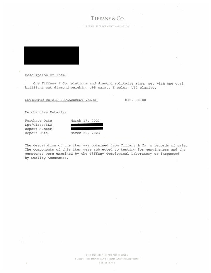 Tiffany & Co. Platinum .95ct E VS2 Oval Diamond Engagement Ring