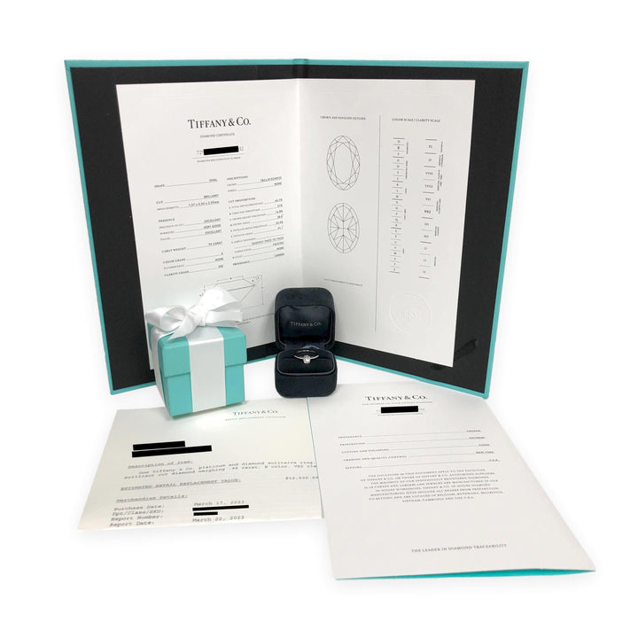 Tiffany & Co. Platinum .95ct E VS2 Oval Diamond Engagement Ring