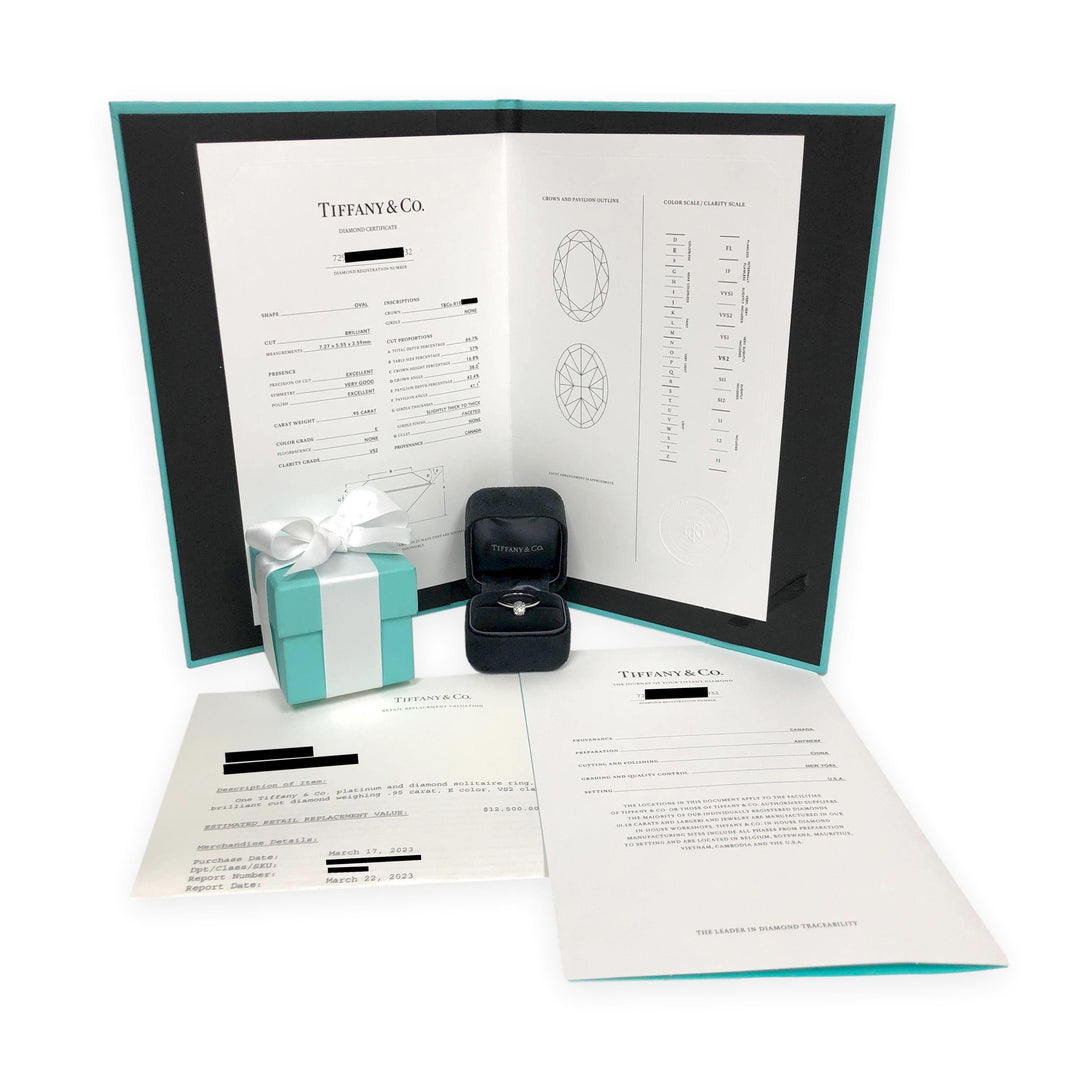 Tiffany & Co. Platinum .95ct E VS2 Oval Diamond Engagement Ring