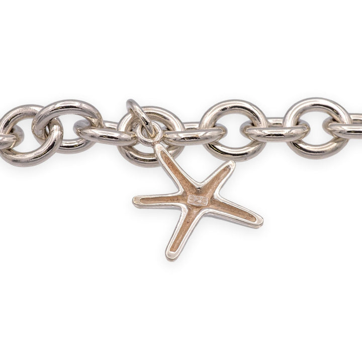 Tiffany & Co. Sterling Silver Heart Charm Bracelet with starfish charm 7.25"