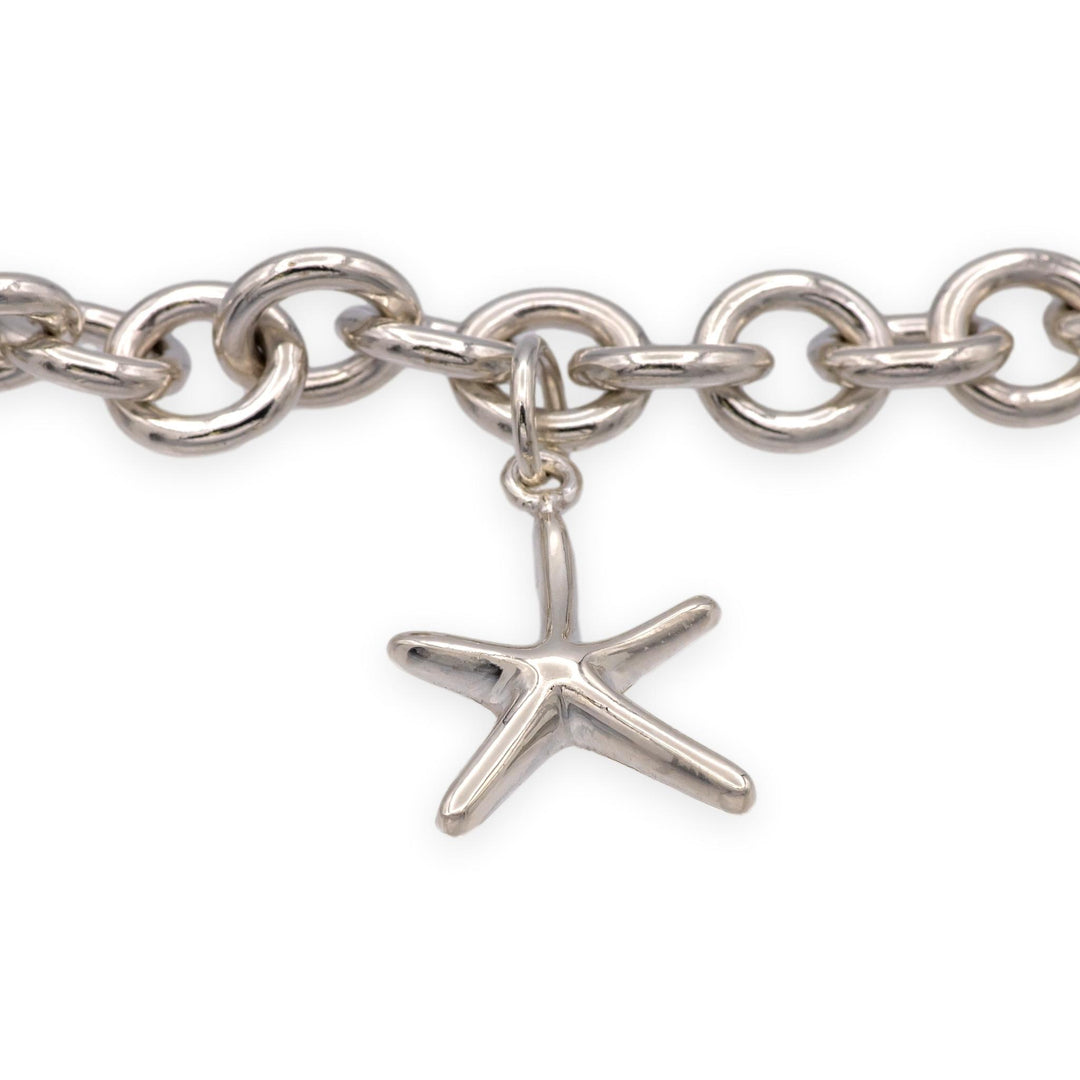 Tiffany & Co. Sterling Silver Heart Charm Bracelet with starfish charm 7.25"