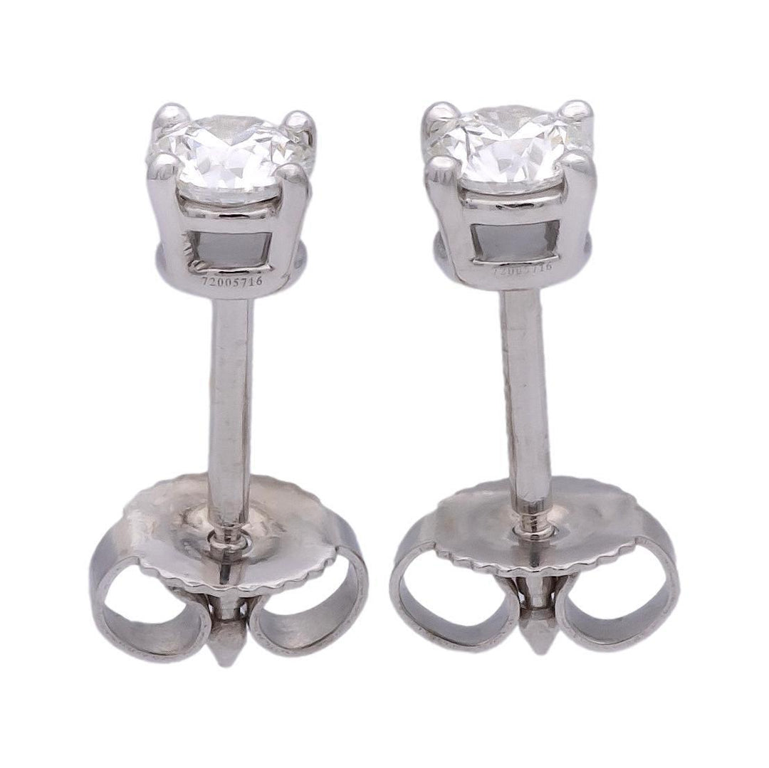 Tiffany & Co. Platinum Round .62 Cts. TW Diamond FVS1 Solitaire Stud Earrings