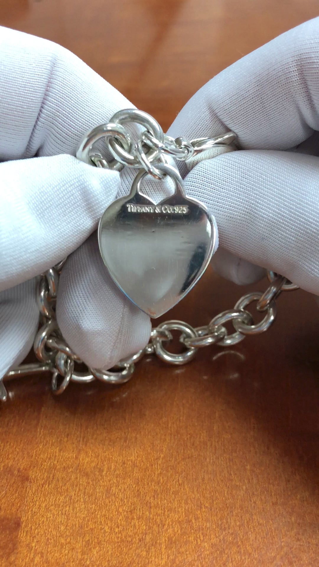Tiffany & Co. Sterling Silver Heart Charm Bracelet with starfish charm 7.25"