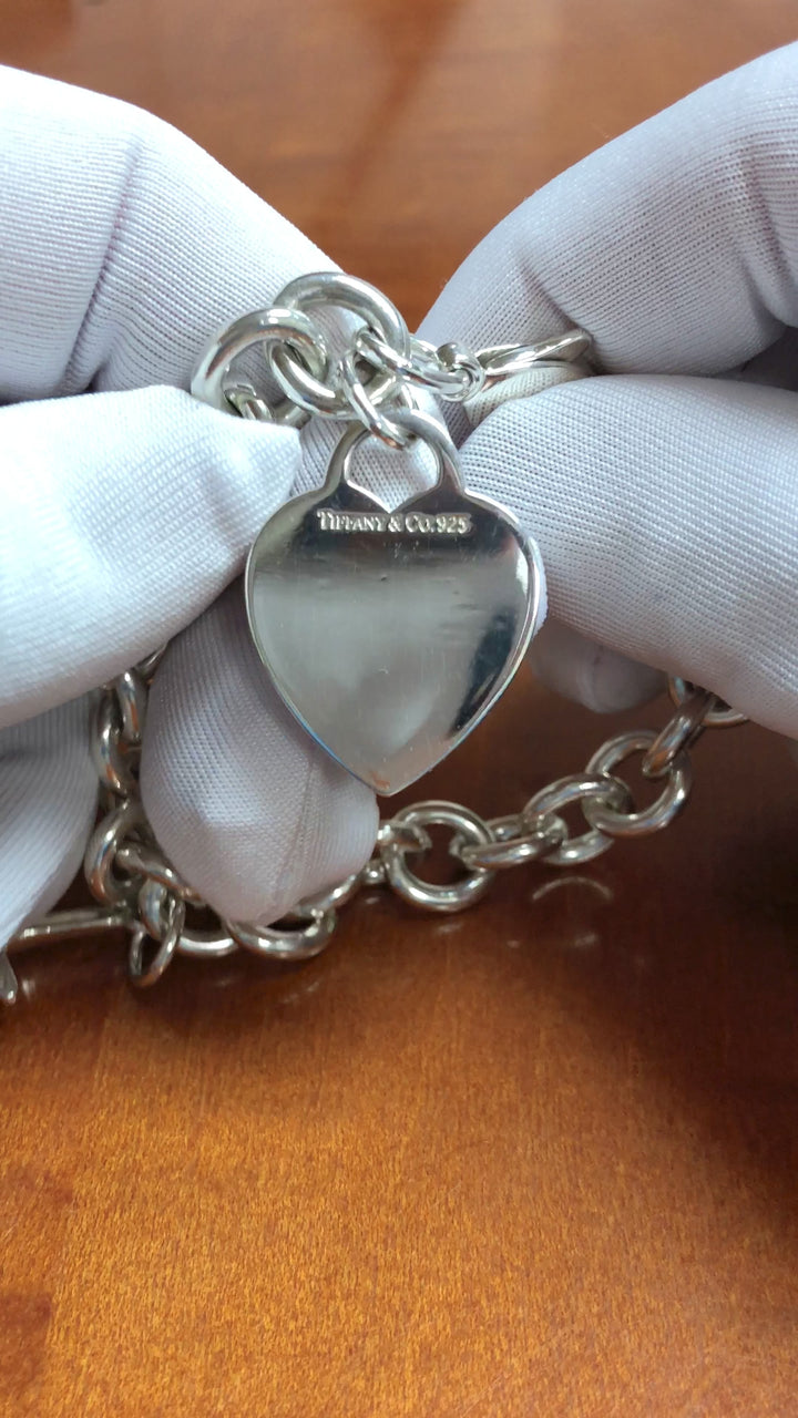 Tiffany & Co. Sterling Silver Heart Charm Bracelet with starfish charm 7.25"