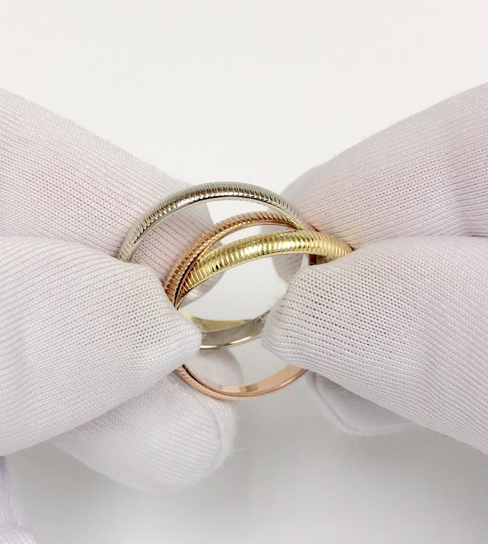 Vintage Cartier 18K Gold Ribbed Trinity Rolling Band Ring Size 7.5 Circa 1980's