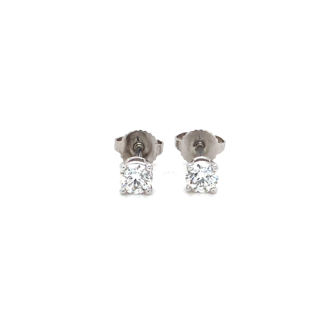 Tiffany & Co. Platinum Round .62 Cts. TW Diamond FVS1 Solitaire Stud Earrings